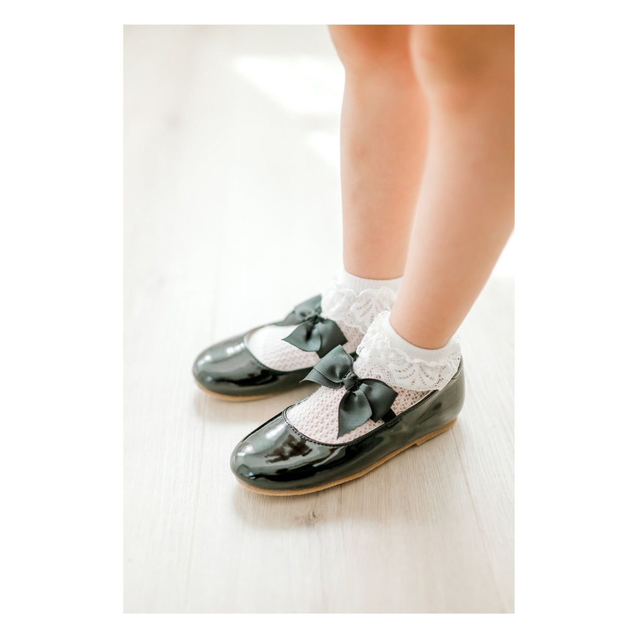 Amelia Bow Flat | Patent Black