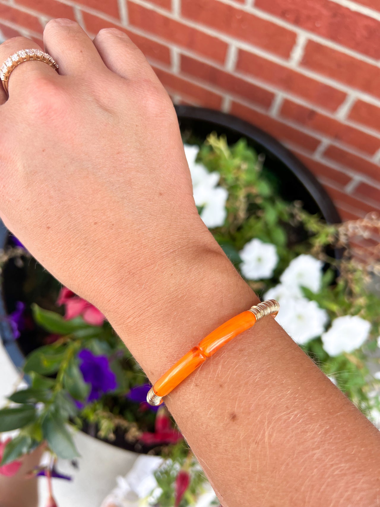 Small Orange Swirl Gold Disc Bracelet