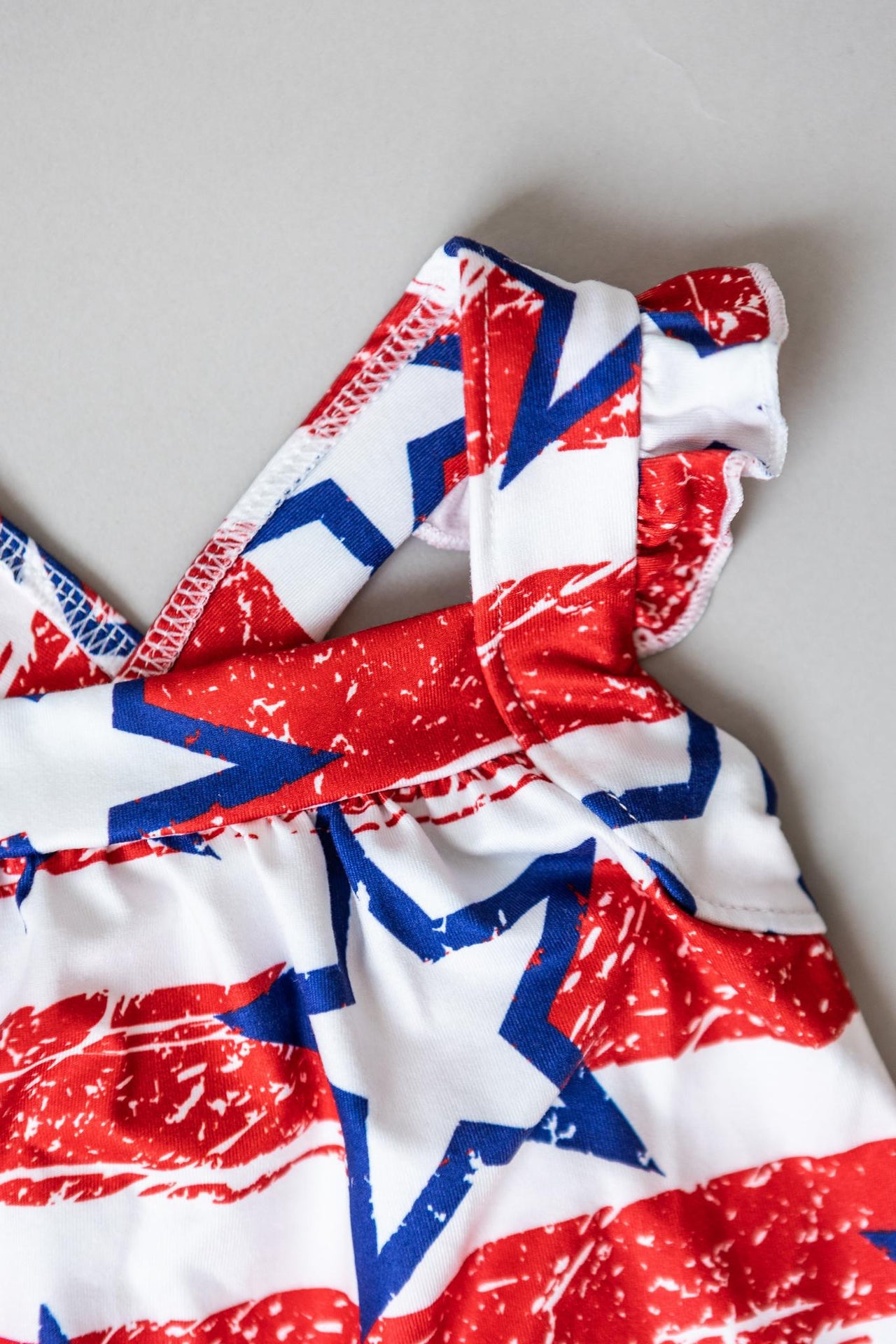Stars and Stripes Ruffle Cross Back Romper **FINAL SALE**